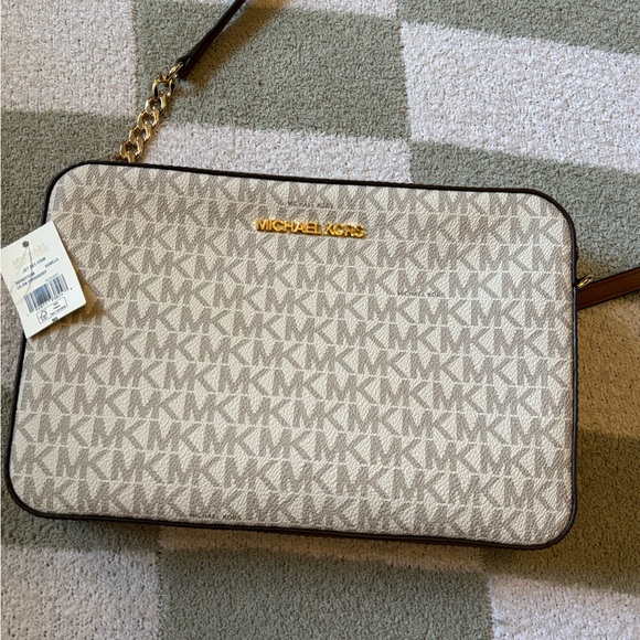 Michael Kors Handbags - NEW Michael Kors Jet Set Large Logo Crossbody Bag in Vanilla